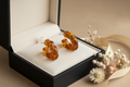 Boucles d’oreilles T
