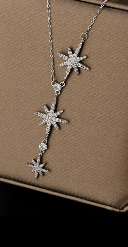 collier argent Tat