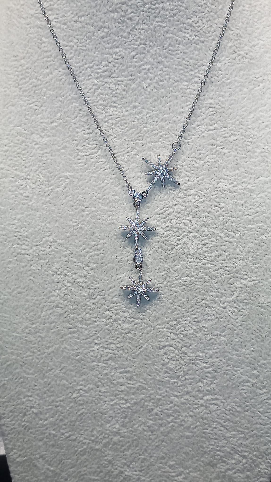 collier argent Tat